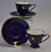 Pair of Japanese Golf Cup and Saucer Sets 'Koransha' stamp to the base, in blue with gold rims all