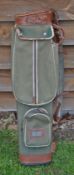 Fine Leyland leather and canvas oval golf bag complete with all pocket, original leather strap
