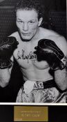 Sir Henry Cooper Signed Boxing print in black and white, half body length fighting pose, signed in