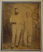 Early W.G Grace and Henry Jupp cricket photograph - a young Grace holding a cricket ball together