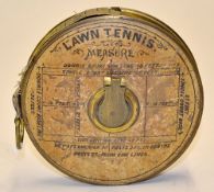 Early brass lawn tennis measuring tape with the original paper label with dimensions for laying