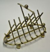 Silver Plated Golf Toast Rack a mixture of squash mesh golf balls and crossed clubs fixed to an oval