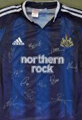 2004 Newcastle Signed Football shirt a replica shirt, signed by players such as Babayaro, Bramble,