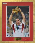 2003 Rugby World Cup signed photograph -Martin Johnson England Capt lifting the World Cup signed