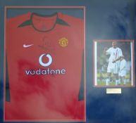 Signed Manchester United Rio Ferdinand signed display featuring a replica Manchester United shirt