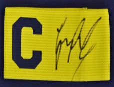 Gary Linekar Signed captains armband a yellow armband with 'C' and Linekar's signature in ink