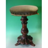 Victorian Walnut Piano Stool the screw adjusting over-stuffed seat raised on a lappet moulded column