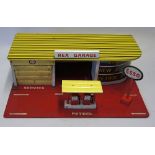 Wooden Esso 'Rex' Garage includes service bay, petrol pump and showroom section, folding road,