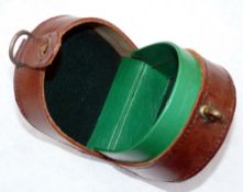 REEL CASE: Contemporary block leather Aerial reel case, internal diameter 4", green baize/leather