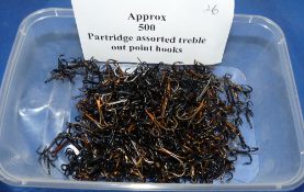 HOOKS: Approximately 500 Partridge assorted treble out point hooks, barbed.