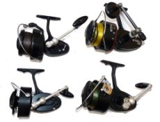 REELS: (4) Four Mitchell spinning reels, French 316, black finish, skirted spool, oversize head,