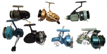 REELS: (7) Collection of seven USA spinning reels, incl. Heddon High-Speed 205R LHW, 2 tone green