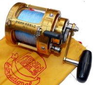 REEL: Penn International 16S multiplier reel, gold finish, lever drag with pre-set, rod saddle