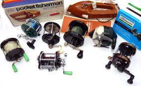 REELS: (8) Collection of eight multiplier and bait casting reels, incl. Penn 77, Penn Peerless No.9,