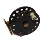 REEL: An ebonite/brass Facile reel, 4" perforated drum, counterbalanced crazed white handle,