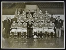 1957 Manchester United Team Squad Photograph in black and white, stamped Daily Herald to the reverse