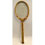 Unusual French "Modele Depose" wooden concave wedge tennis racket with deep slots to either side
