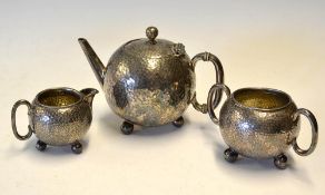 Silver plated dimple tea set - comprising tea pot, sugar and cream depicting golf balls to an art