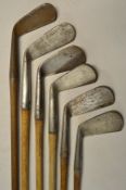 6x Various smooth faced irons including a small head driving iron by Scott Elie, P Caffety Barnton
