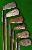 6x various left hand irons including a round back niblick by D Adams Glasgow, a Gibson mid-iron,