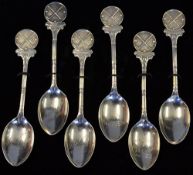 Set of 6 matching silver monthly medal golfing teaspoons c. 1931/32 - each mounted with circular