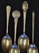 4x silver golf teaspoons - 2x decorated with period golfers, golf club stem and one engraved with "