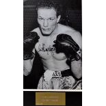 Sir Henry Cooper Signed Boxing print in black and white, half body length fighting pose, signed in