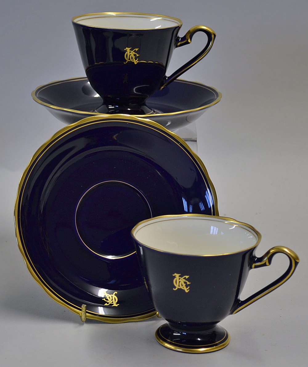 Pair of Japanese Golf Cup and Saucer Sets 'Koransha' stamp to the base, in blue with gold rims all