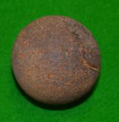 A large unusual smooth composite golf ball c/w seam - it has all the characteristics of being a