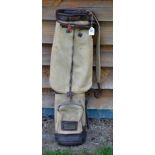 Gradidge leather and canvas oval golf bag complete with travel hood, ball pocket, leather dividers