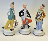 3x Porcelain Hobo Style Bisque Clown Figurines featuring three colourful standing figures, no makers
