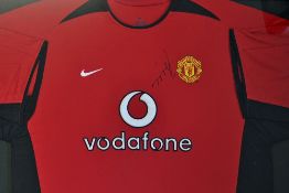 Juan Veron Signed Manchester United football shirt a replica home shirt, signed to the front in ink,