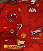 Manchester United Signed football shirt selection includes all home signed replica shirts from