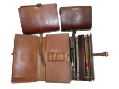 WALLETS: (3) Pair of Hardy leather fly wallets, parchment interiors, one with clear cast pockets