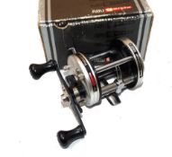 REEL: Abu Ambassadeur 6500C multiplier reel, silver domed end plate, level wind, free spool, twin