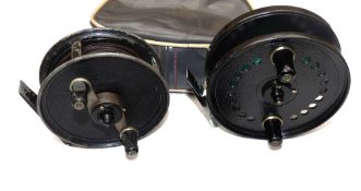 REELS: (2) Fine JW Young Seldex alloy trotting reel, 4.25" diameter, black handles, plated foot,