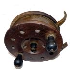 REEL: Heaton's lever brake 7" mahogany/brass big game star back reel, stamped "Heaton's Sun