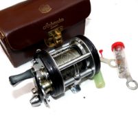 REEL: Abu Sweden Ambassadeur 6000c multiplier reel, 3 screw ribbed end plate ,black finish, foot