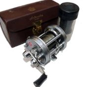 REEL: Abu Sweden Ambassadeur 6500c multiplier reel, 3 screw smooth end plate ,silver finish, foot