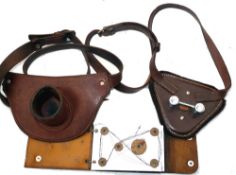 ACCESSORIES: (3) Pair of leather rod butt pads with waist belts, one tube fitting, one with Gimble