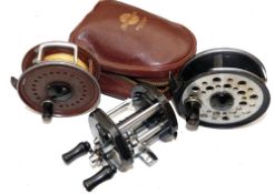 REELS: (3) Three JW Young reels, a Gildex black finish multiplier reel, hinged foot, level wind,