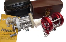 REELS: (2) Fine Abu 6000 Ambassadeur multiplier reel, 4 screw grooved red end plate, no foot