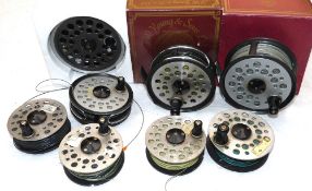 REELS & SPOOLS: (8) Collection of JW Young fly reels and spools, a 1540 salmon reel in new