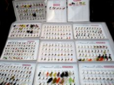 FLIES: Collection of 12 Masterline Dragon salesman's sample flies, containing trays of trout fishing