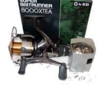REEL: Shimano Baitrunner 8000 XTEA, 7 bearings, double handle, rear drag and baitrunner, new with
