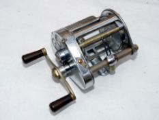 REEL: Hardy Elarex multiplier reel, chrome plated, twin black handles, level wind, ratchet and brake