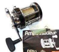 REEL: Abu Ambassadeur 7000C black multiplier reel, foot stamp 820800, 3 screw smooth black end