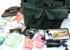 ACCESSORIES: Wychwood multi pocket large angler's bag, containing one metal and one plastic