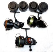 REELS & SPOOLS: (7) Mitchell 300 spinning reel with spring fold handle, metal spool, c/w 4 spare