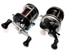 REELS (2): Abu Garcia 5500C multiplier reel, silver domes end plate, foot stamp84-4 87-88. Free